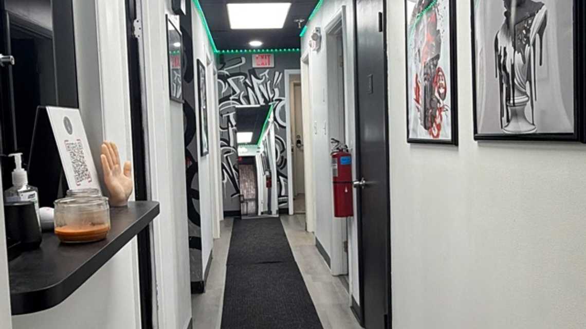 Ink and Needles Tattoo Studio cover image